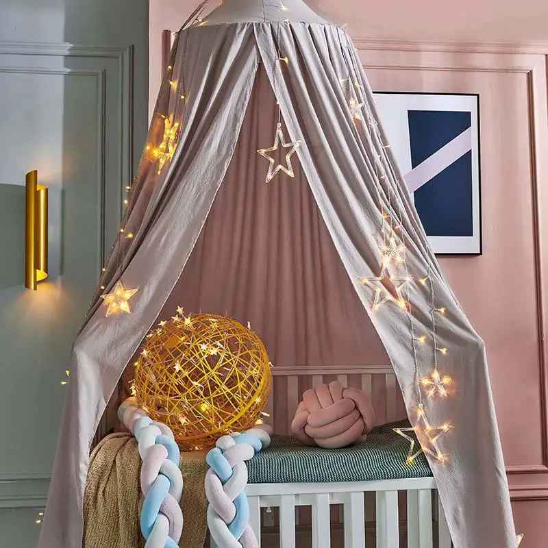Ciel de lit bébé | Voilage doux rose pour créer un cocon féerique - Mes Essentiels Bébé
