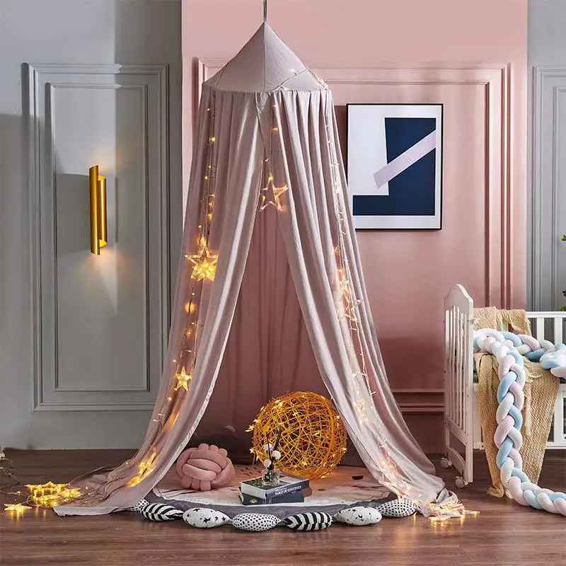 Ciel de lit bébé | Voilage doux rose pour créer un cocon féerique - Mes Essentiels Bébé