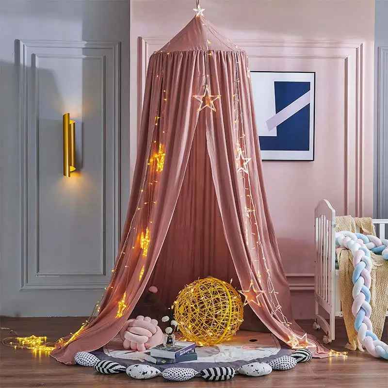 Ciel de lit bébé | Voilage doux rose pour créer un cocon féerique - Mes Essentiels Bébé
