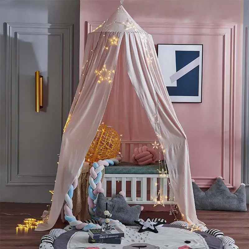 Ciel de lit bébé | Voilage doux rose pour créer un cocon féerique - Mes Essentiels Bébé
