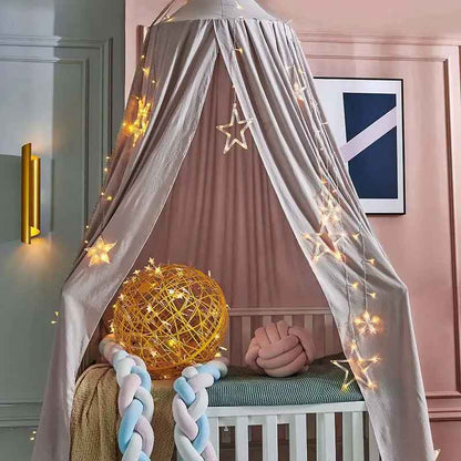 Ciel de lit bébé | Voilage doux rose pour créer un cocon féerique - Mes Essentiels Bébé